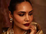 Esha Gupta is a queen of ethnic fashion in season's favourite trend, the gold silk saree